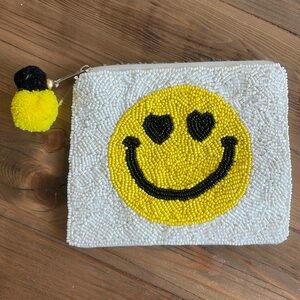 Beaded smiley face pouch
